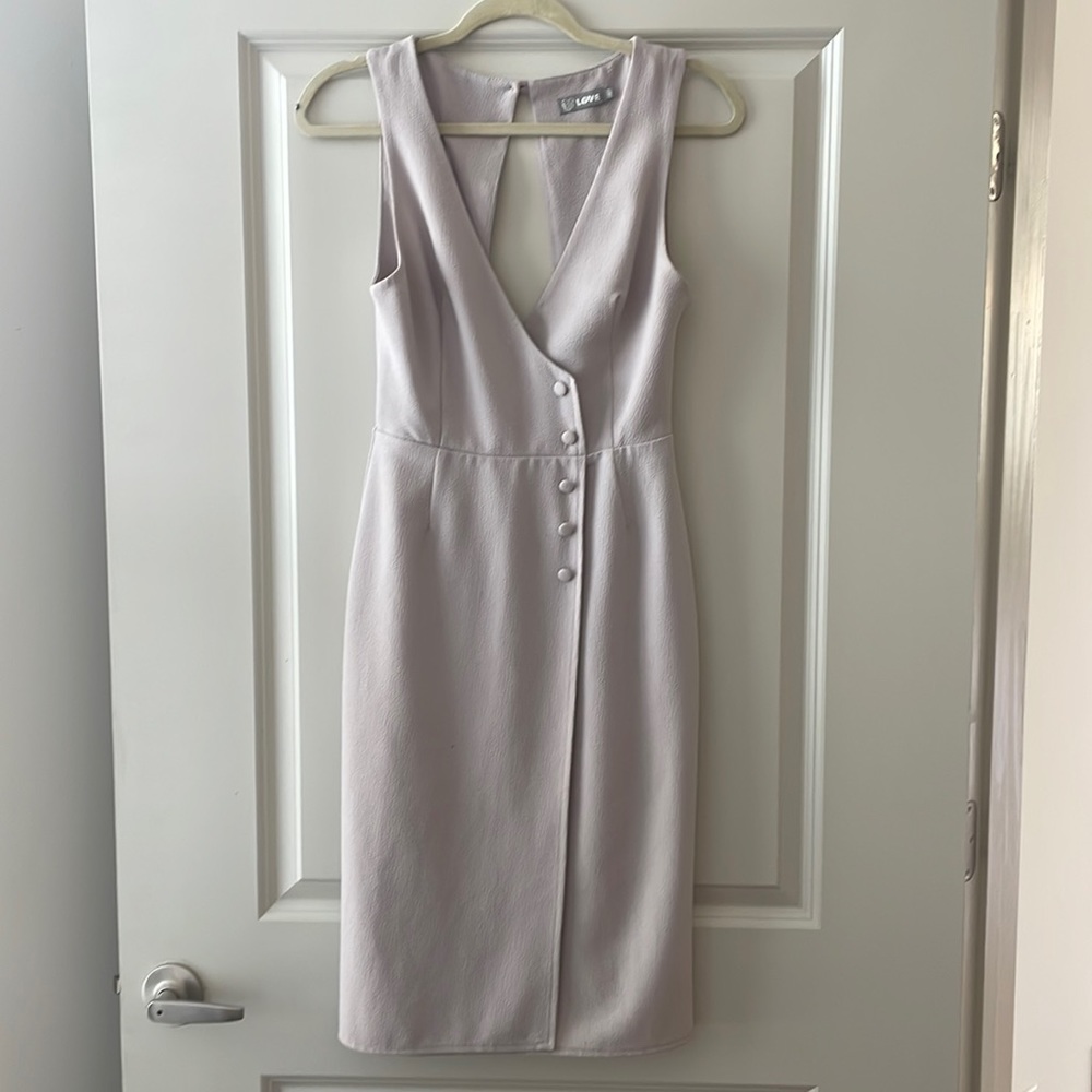 sleek office or wedding guest midi dress with back cut out